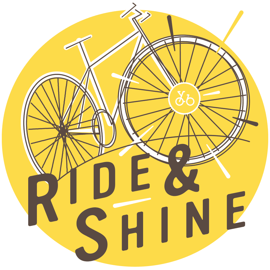 A tagline, Rise and Shine in the Yellow Bike Coffee colors